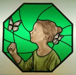 Stained glass girl and butterfly