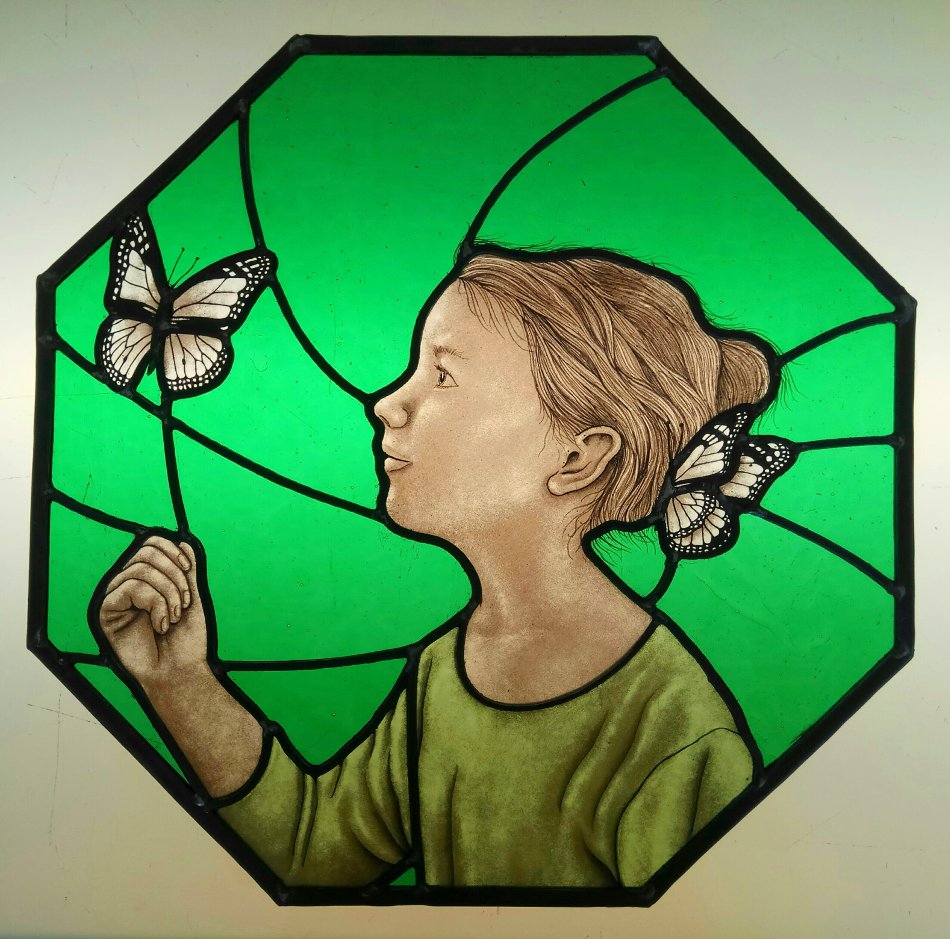 Stained glass girl and butterfly