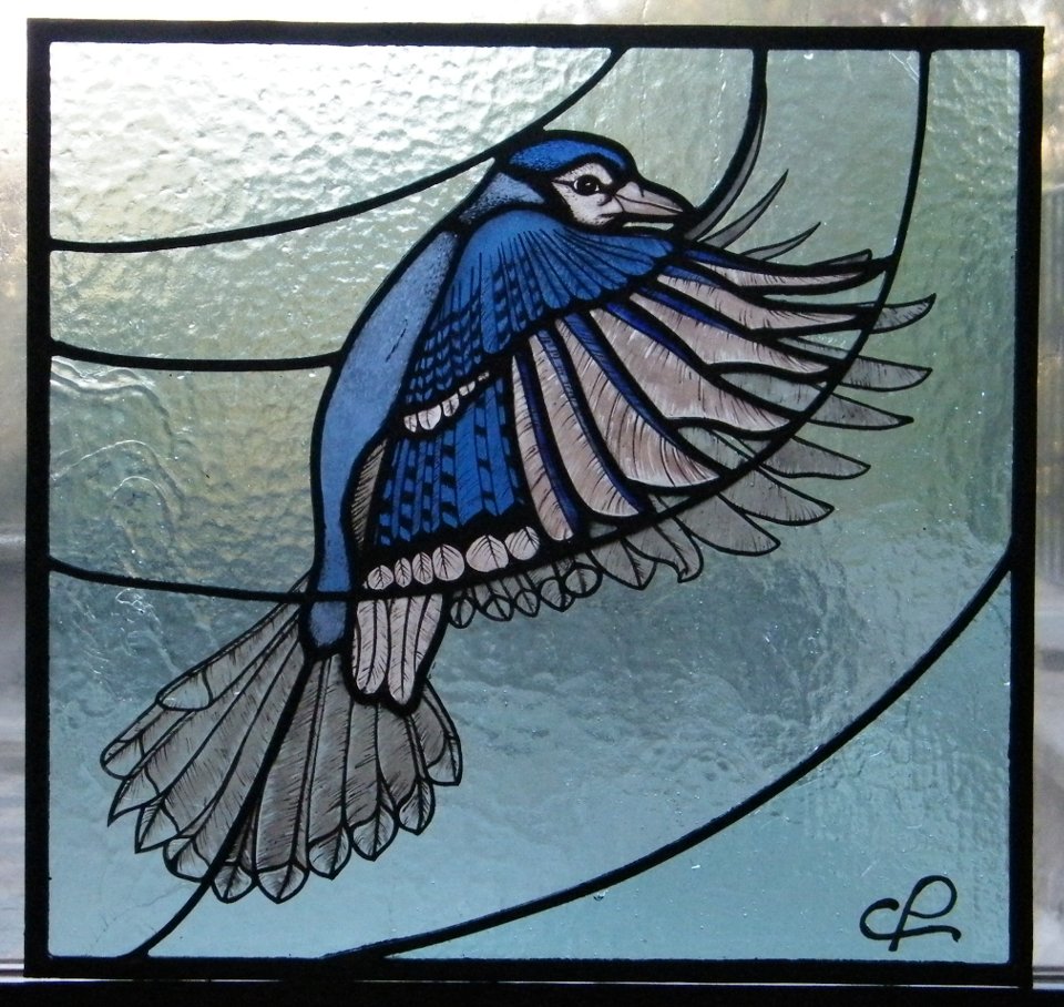 Stained glass with blue jay