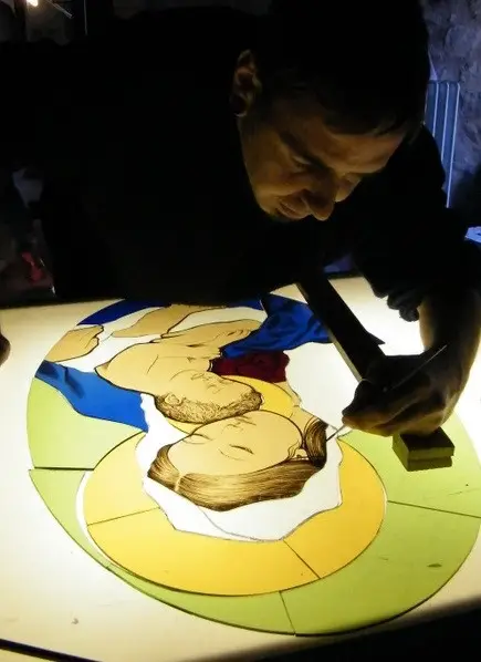 Diego Tolomelli painting on stained glass