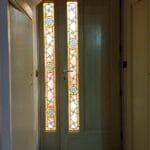 Handcrafted door with stained glass