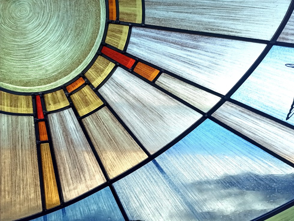 Modern stained glass with the sun