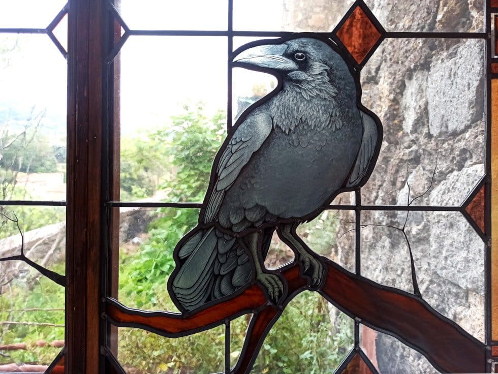 Stained glass windows with crows detail