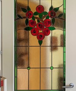 Stained glass door with Mackintosh roses