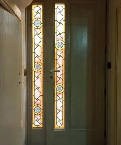 Handcrafted door with stained glass