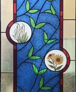 Stained glass window with flowers for a door